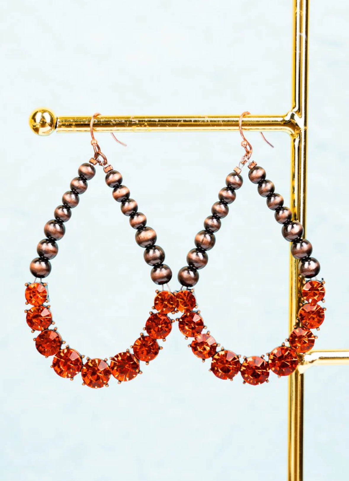 Burnt orange eyes on you crystal and copper pearl earrings